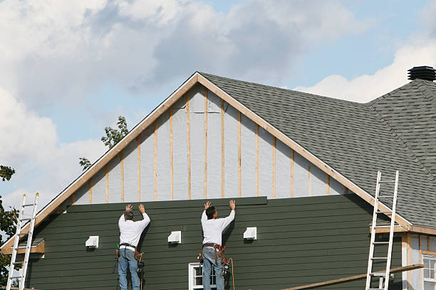 Professional Siding Contractor technician working in Powhatan Point, OH